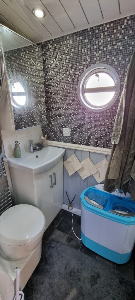 Living and working on a narrowboat bathroom and washing machine